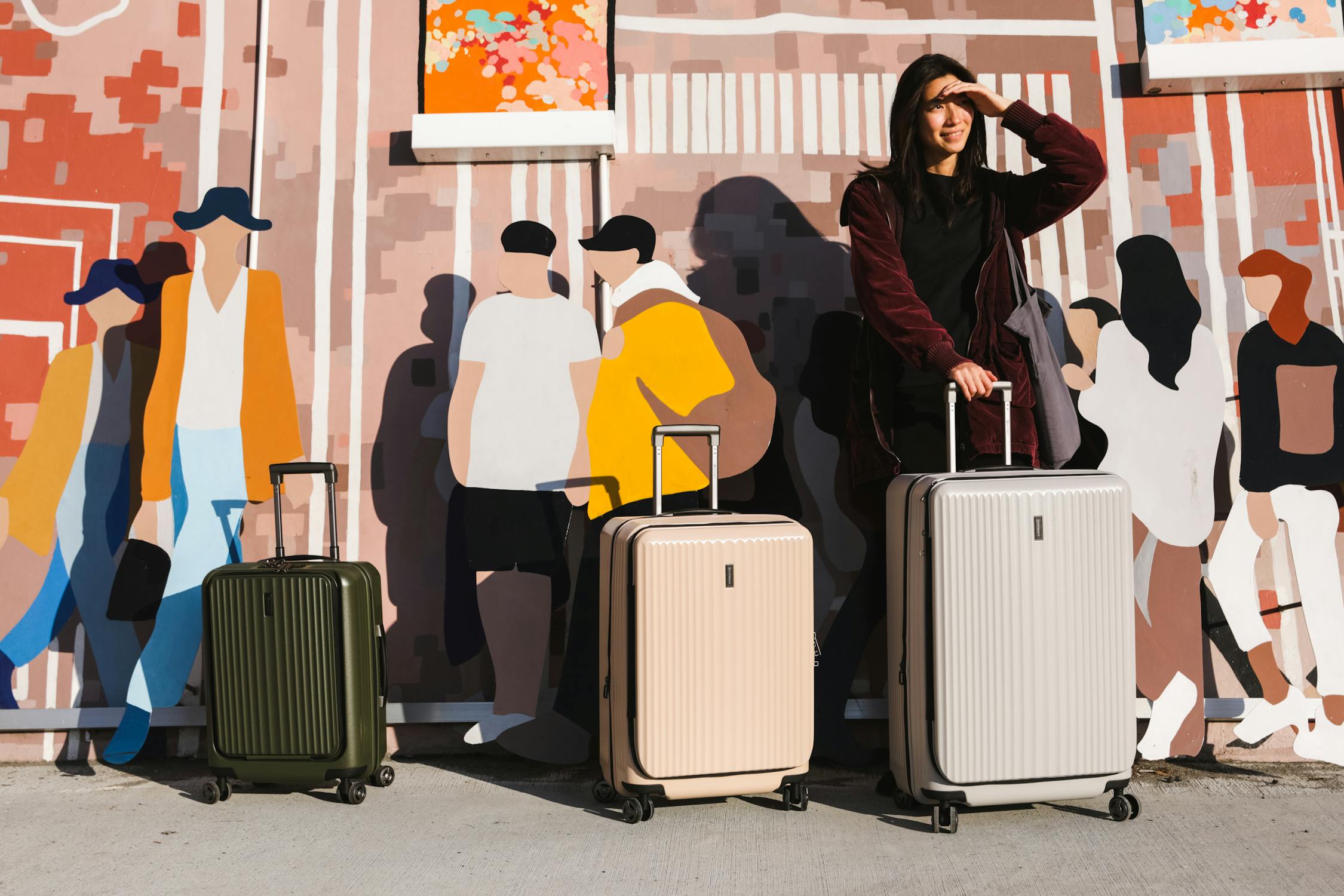 Woman Standing with Suitcases