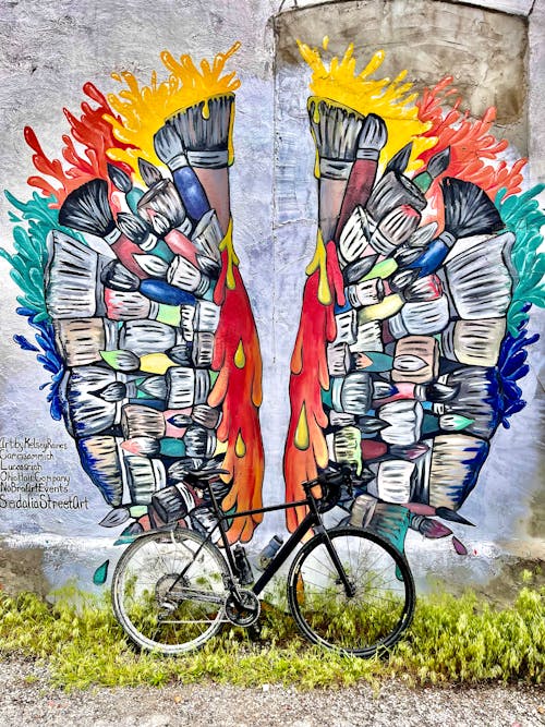 Foto profissional grátis de andar de bicicleta, asas de anjo, asas de bicicleta