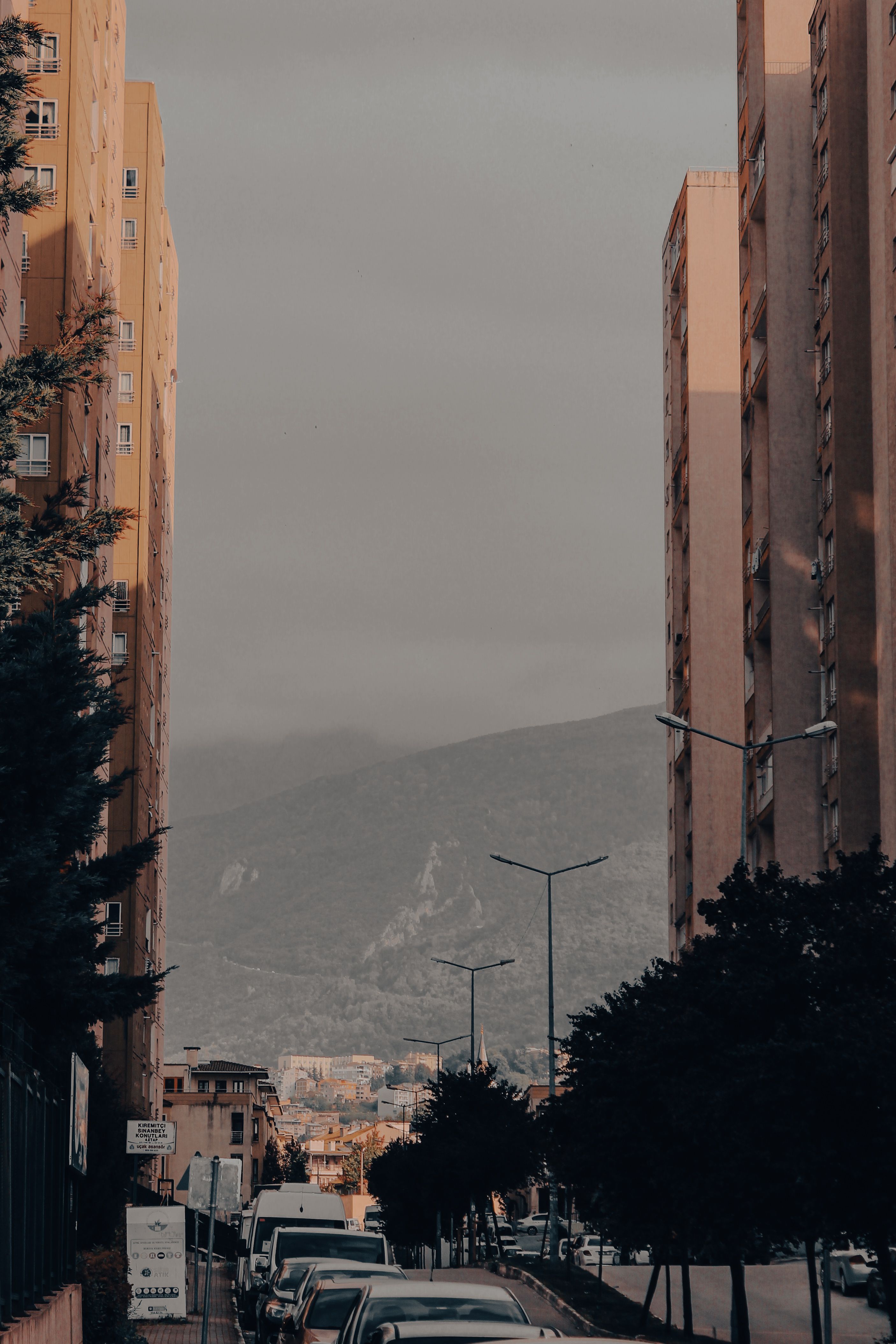 View of View of Mountains from a Street between Apartment Buildings · Free ...