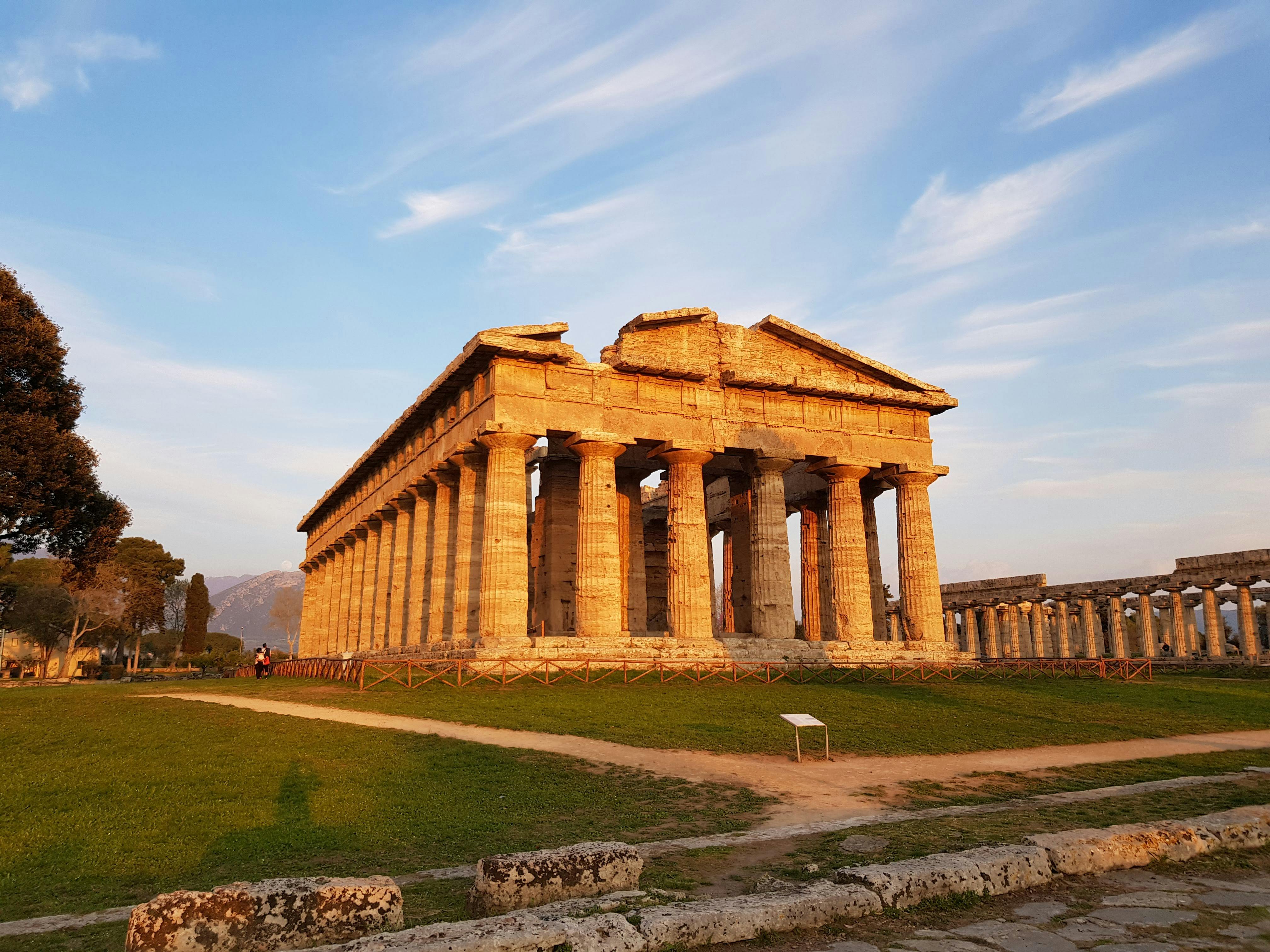 Explore the ancient Temple of Hera in Paestum, Italy, captured at sunset with stunning detail.