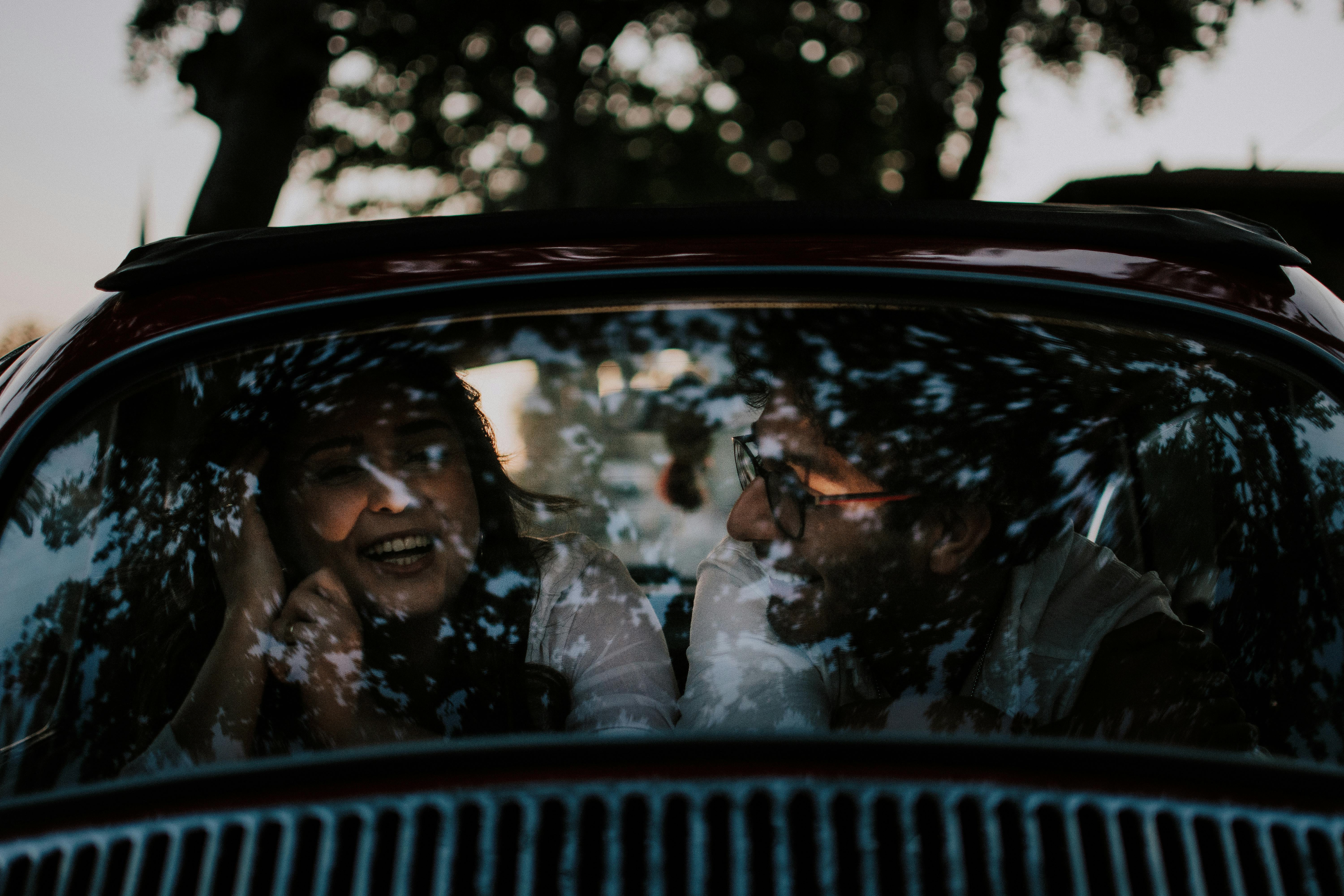 Couple Laughing Together In A Humorous Situation