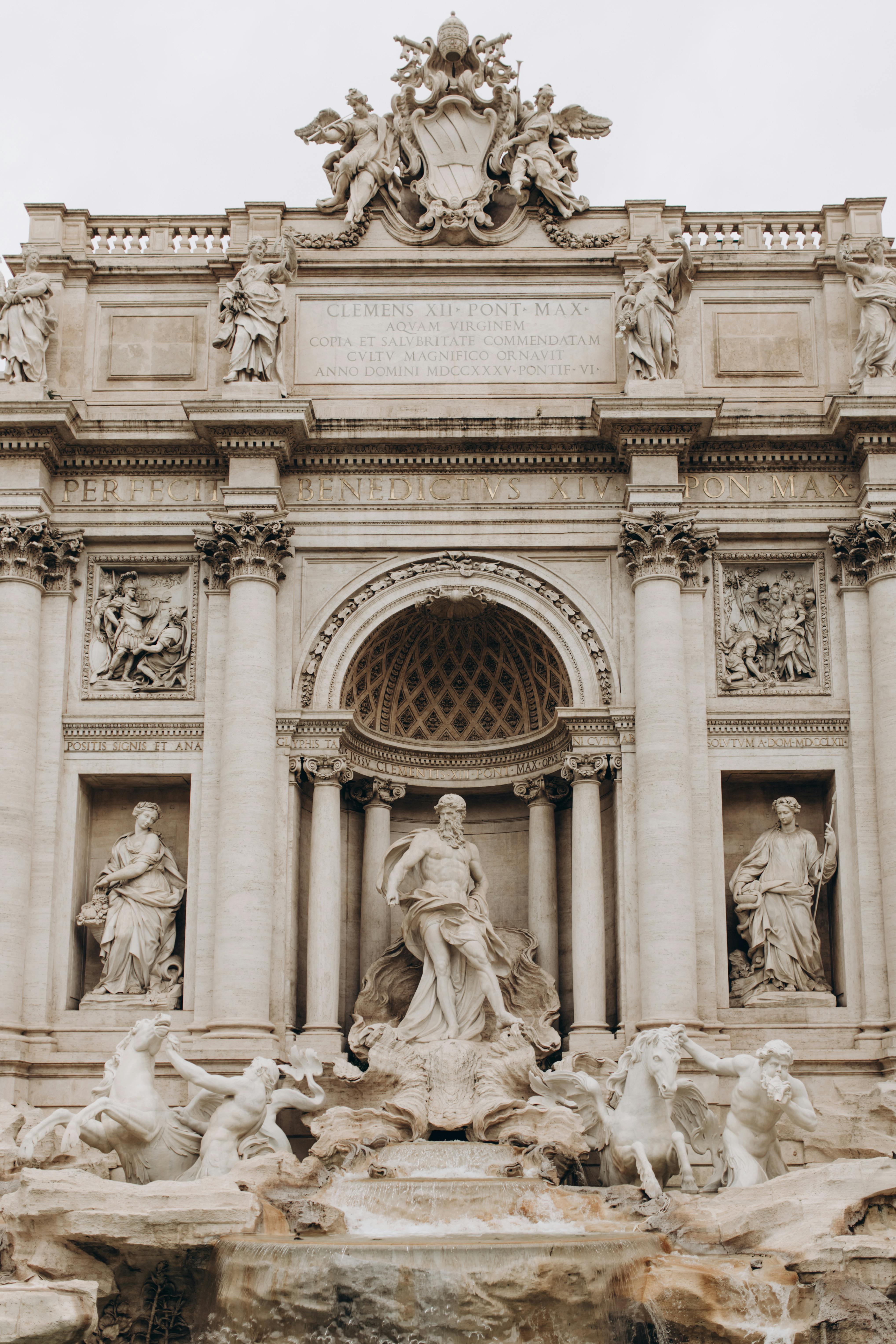 Stunning view of the iconic Trevi Fountain, a renowned landmark in Rome, showcasing intricate sculptures and architecture.