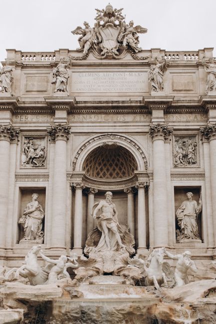 Stunning view of the iconic Trevi Fountain, a renowned landmark in Rome, showcasing intricate sculptures and architecture.
