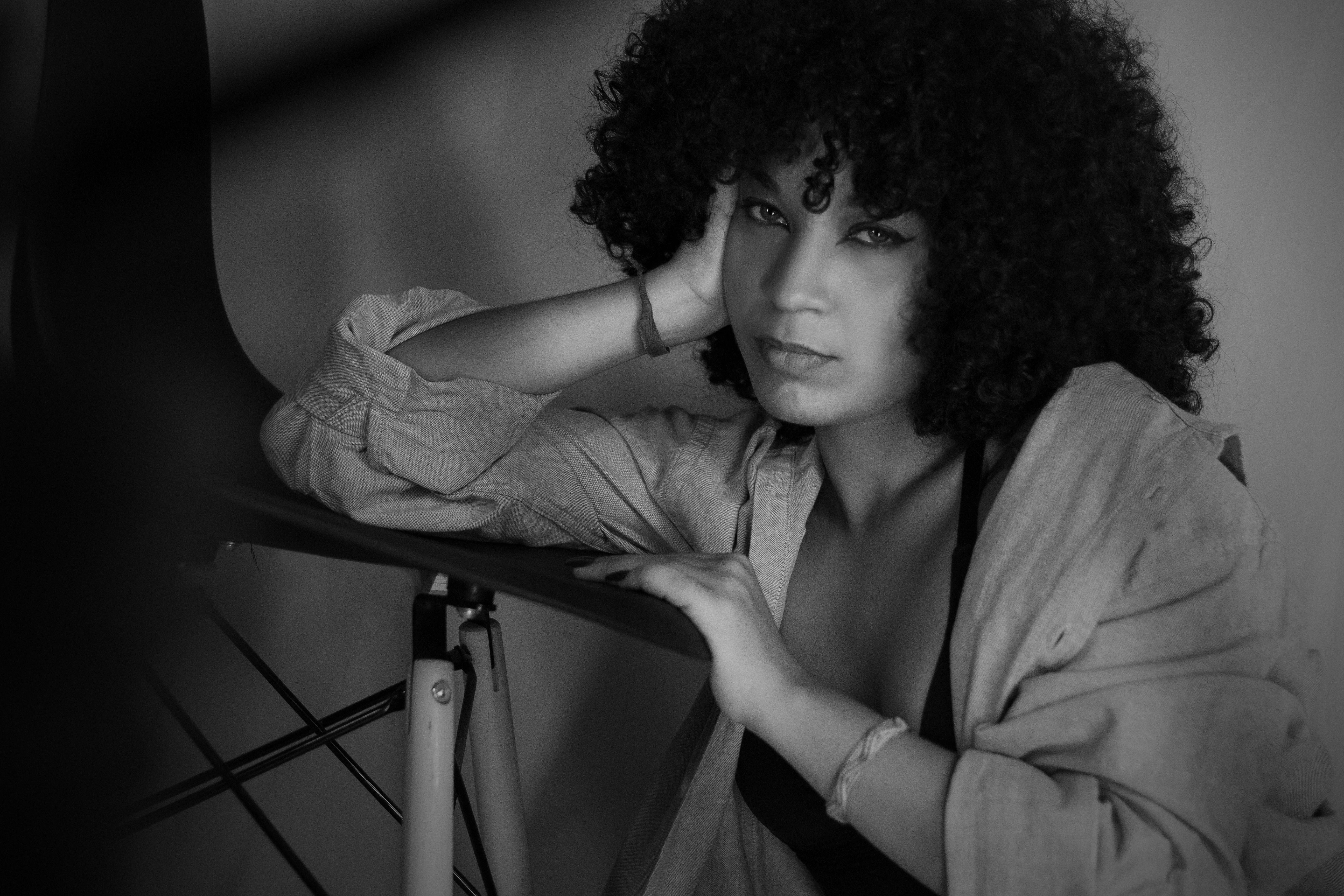 Black and White Portrait of a Young Woman with Curly Hair · Free Stock ...