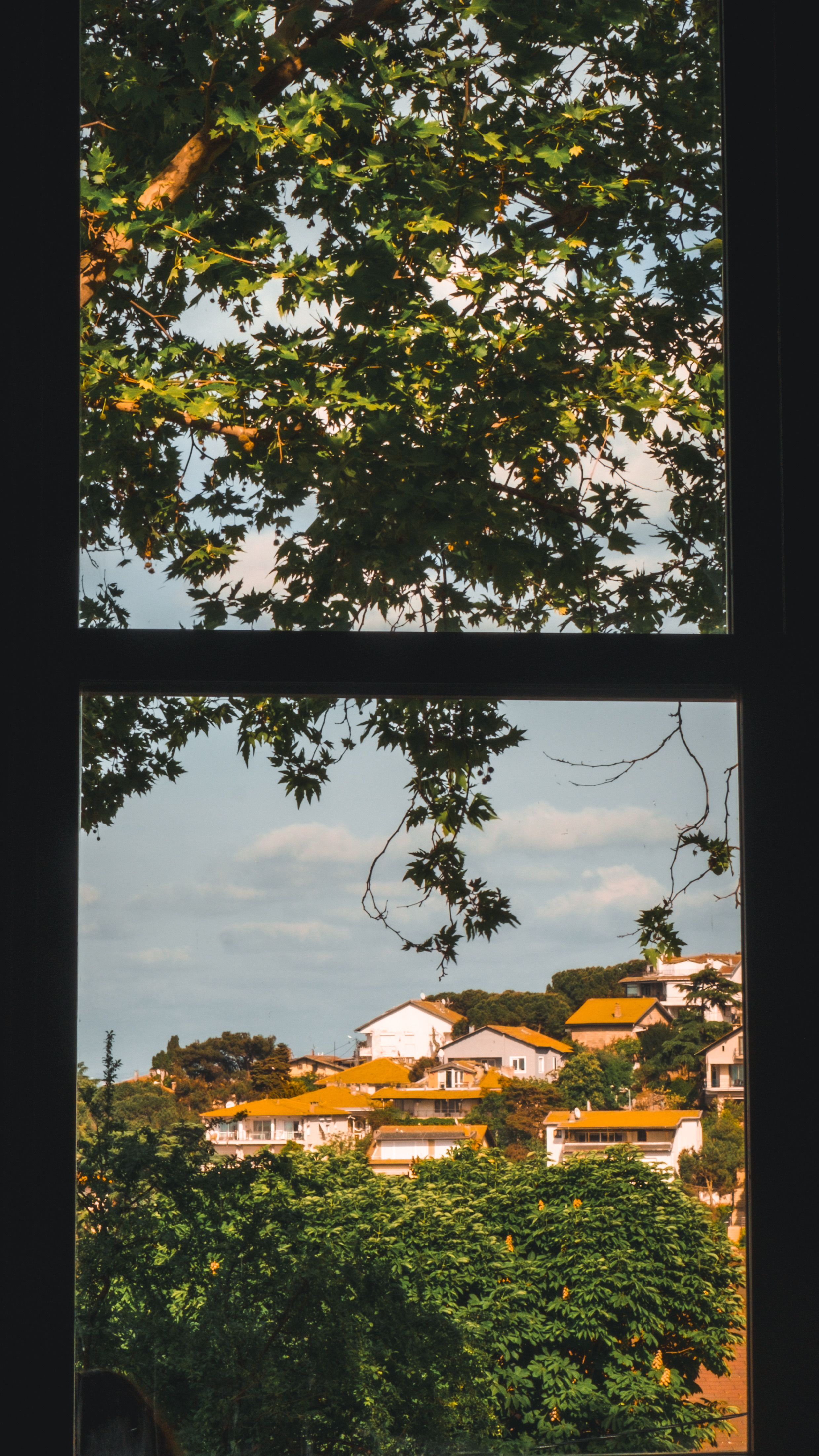 Houses in Town behind Window · Free Stock Photo