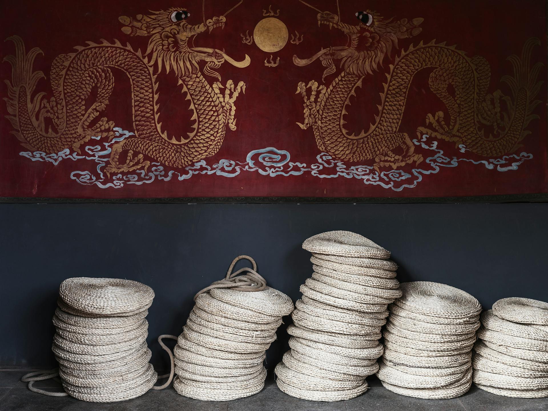 Woven Pads and a Tapestry with Chinese Dragons