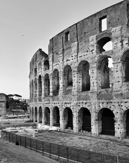 Free Striking black and white photo of the historic Colosseum in Rome, Italy. Stock Photo