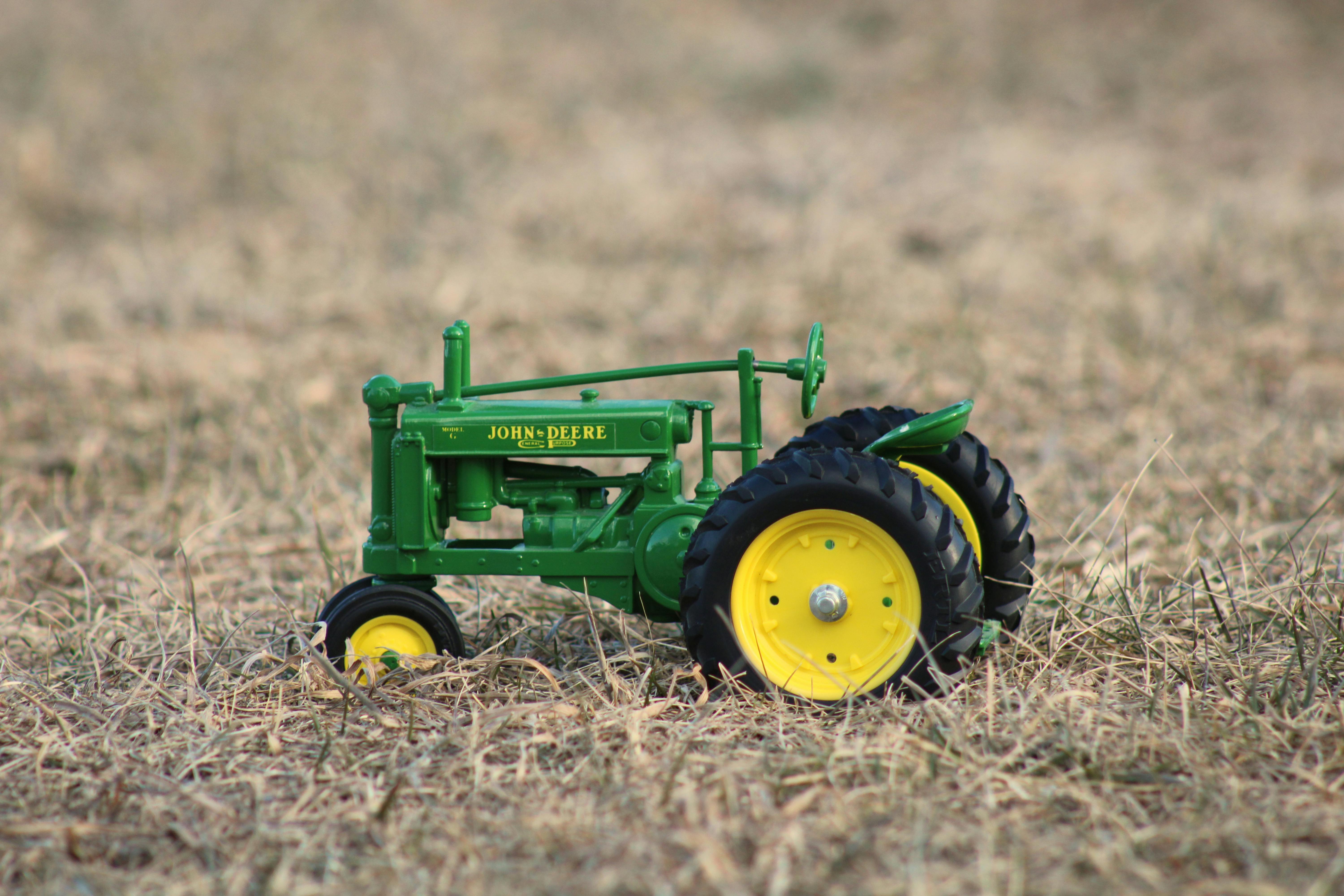 toy tractor on grass