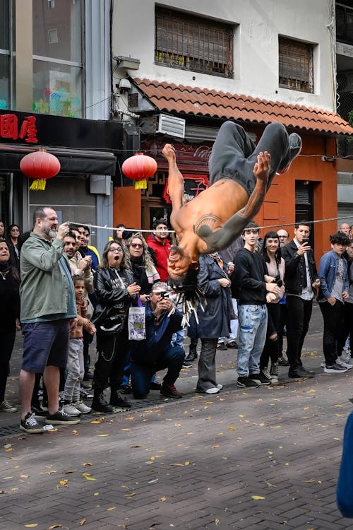 Foto profissional grátis de chinatown, desempenho de rua
