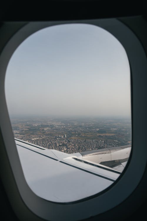 Airliner Window Displaying City