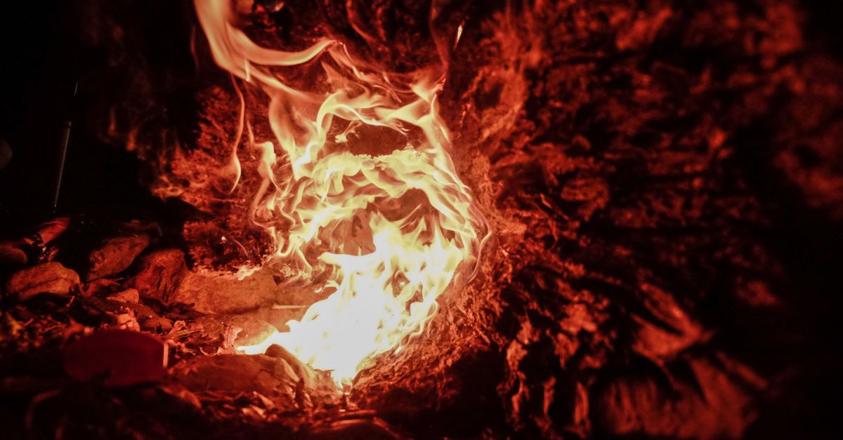 Flame Near Rocks · Free Stock Photo