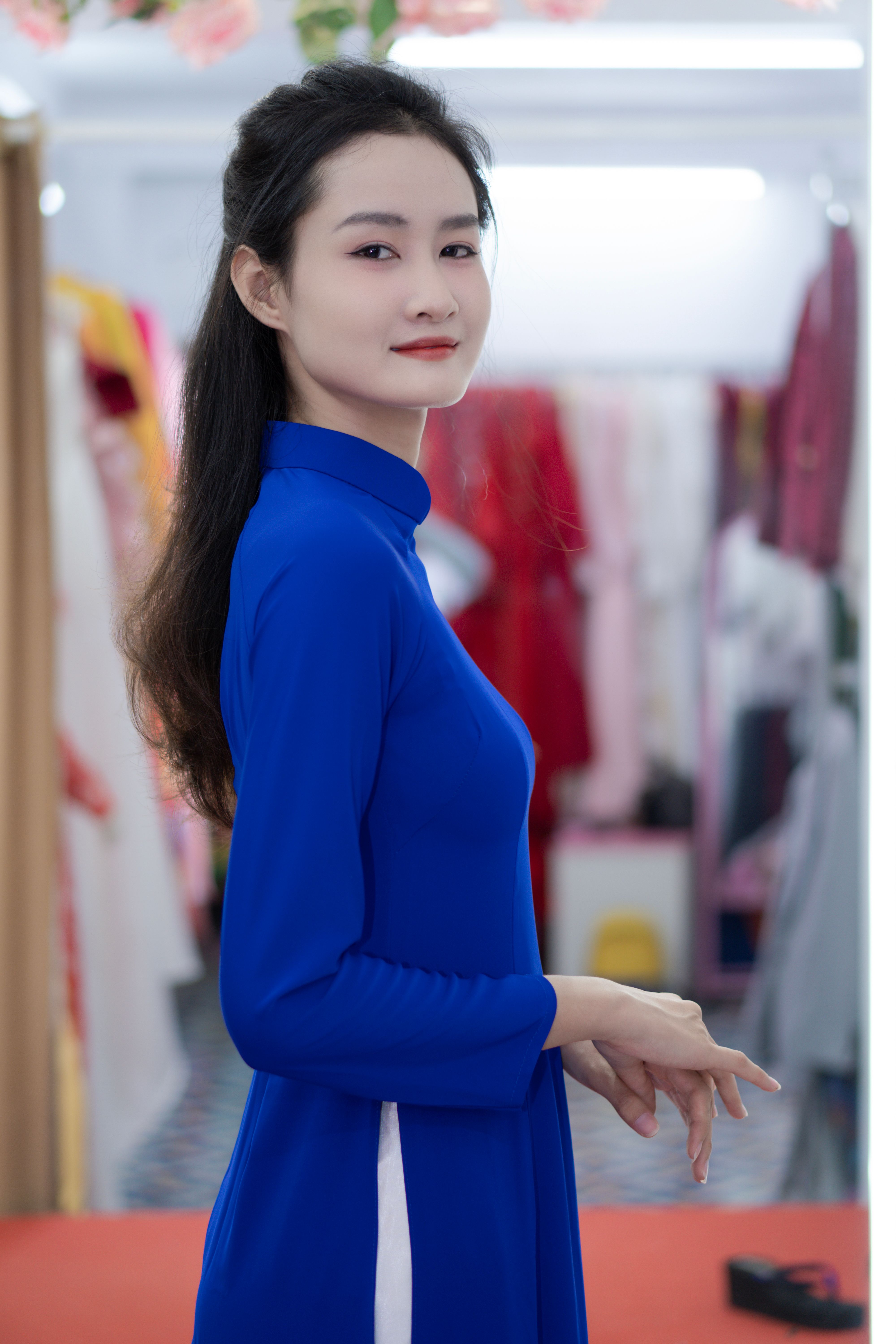 Woman in a Blue Dress and White High Heels  Free Stock Photo