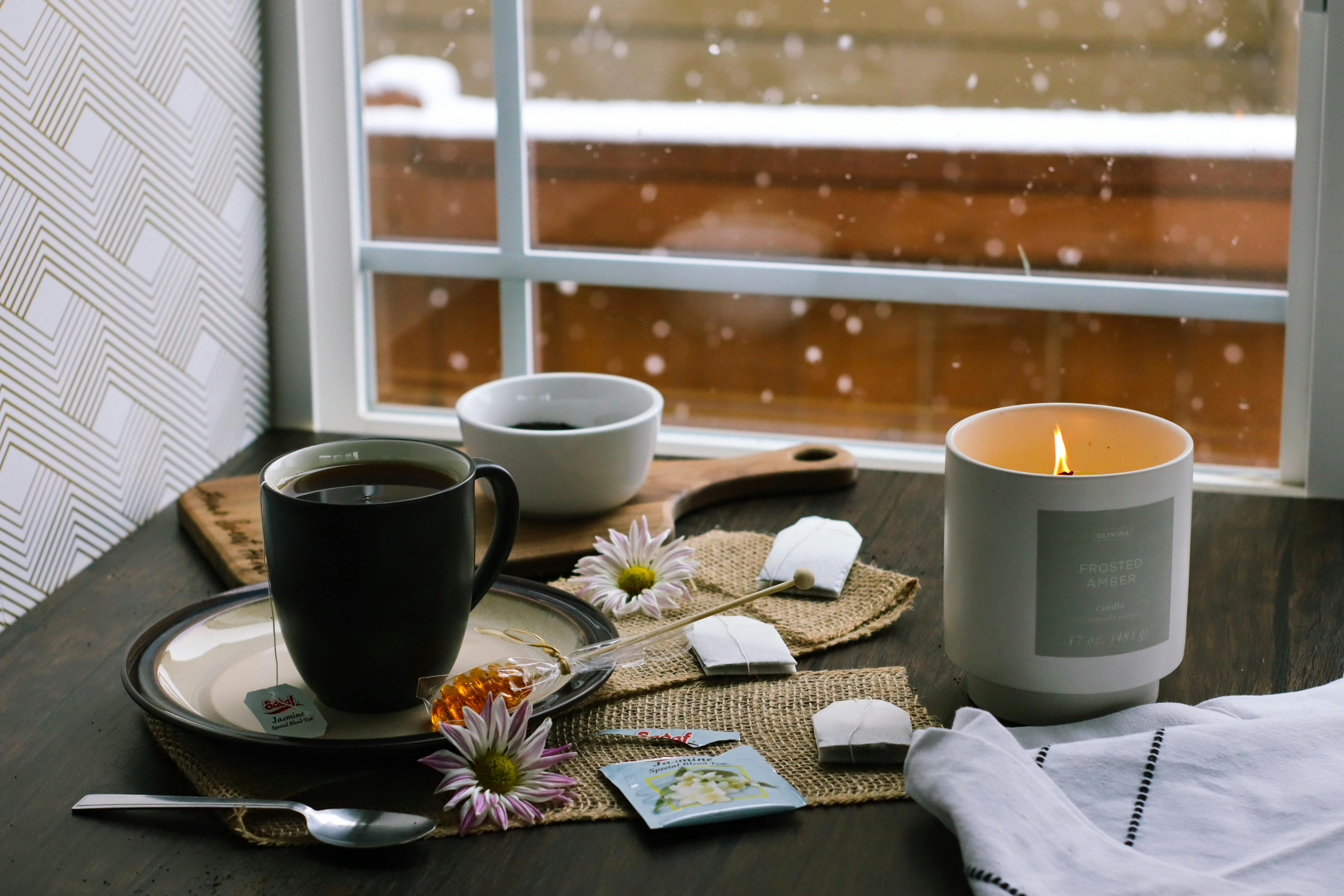 Cup of Chamomile Tea and a Scented Candle