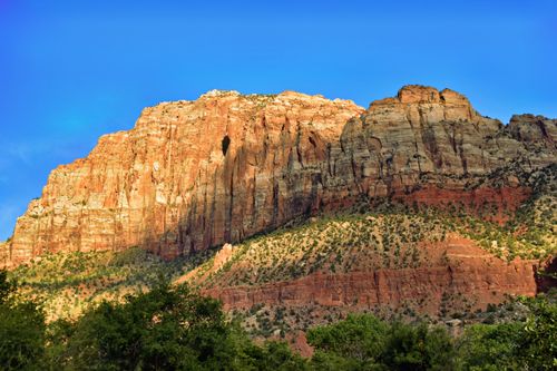 Free Majestic red sandstone cliffs under a clear blue sky in Zion National Park. Stock Photo