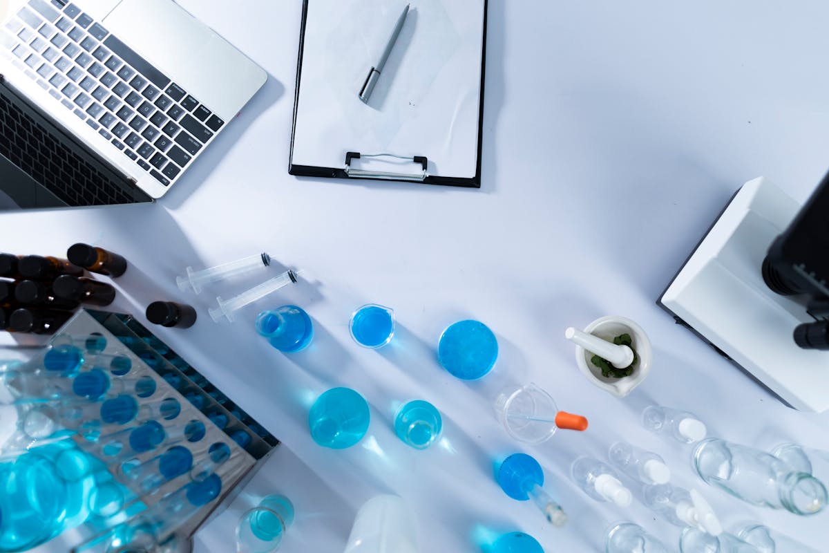 Team of scientists collaborating over data and charts in a lab