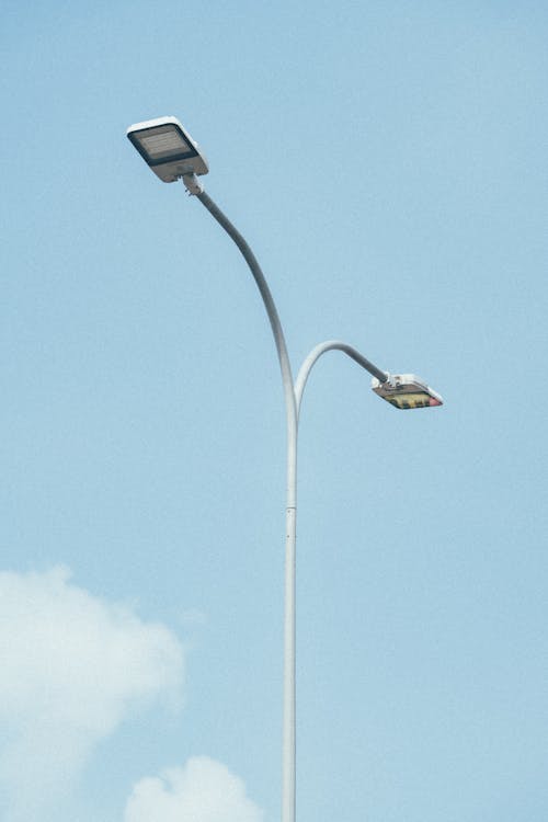 A street light with a pole and a pole