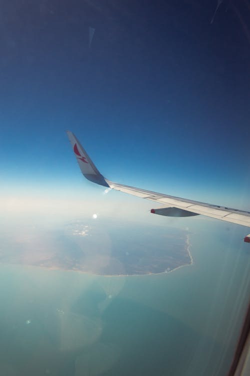 Immagine gratuita di aereo commerciale, attraverso la finestra, stagione delle vacanze