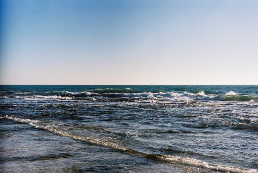 Sea waves and the blue sky