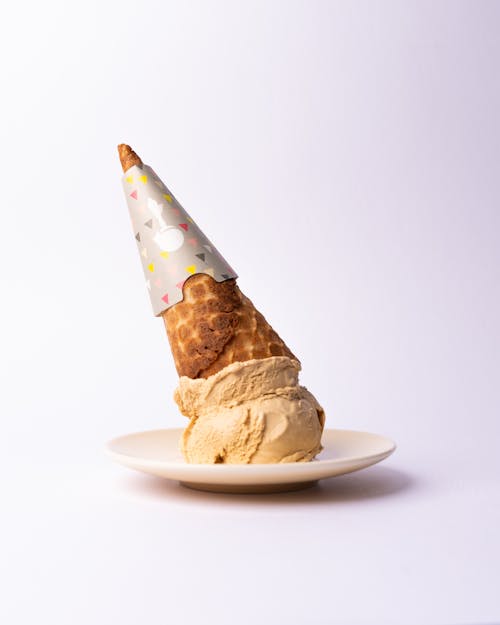 A cone with a birthday hat on top