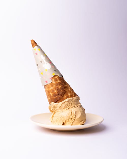 A cone with a birthday hat on top