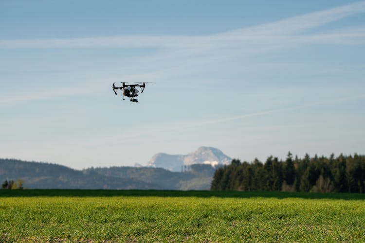 Black Drone On Flight At The Plains