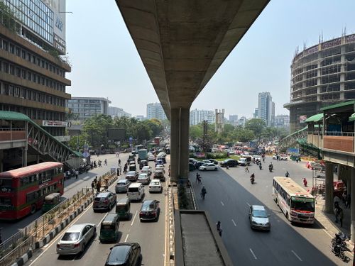 Free A bustling urban scene in Dhaka, Bangladesh featuring busy streets and elevated roads. Stock Photo