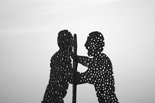Artistic black and white silhouette sculpture located in Berlin, Germany.