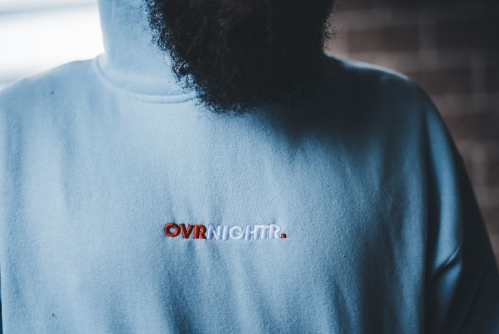 Hoodie with embroidered text