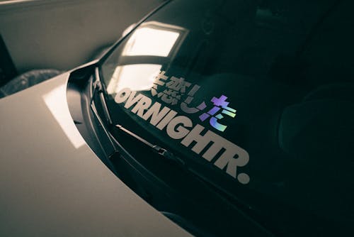 A car with a sticker that says runnigth