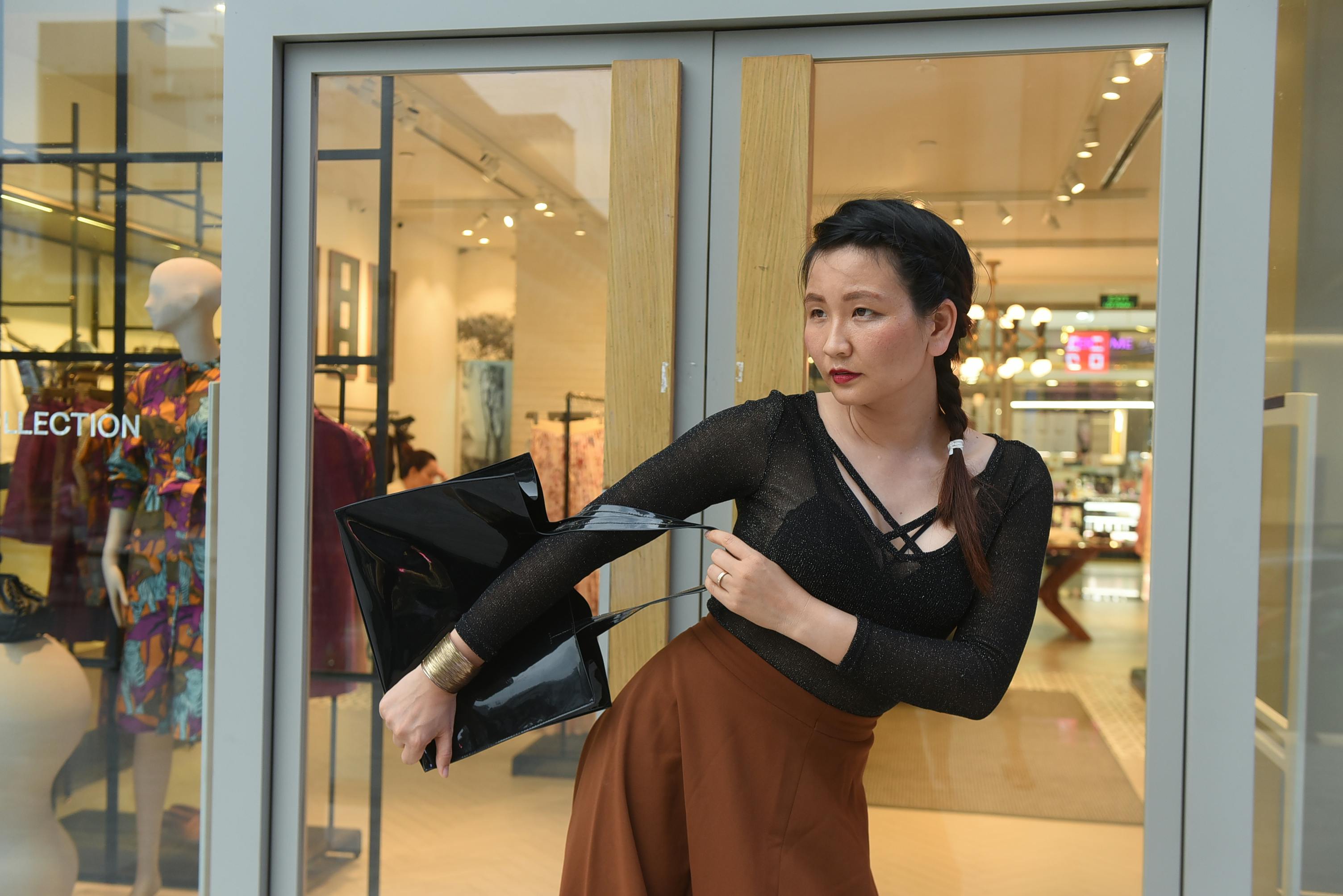 Department store interior with stylish glass showcases on display