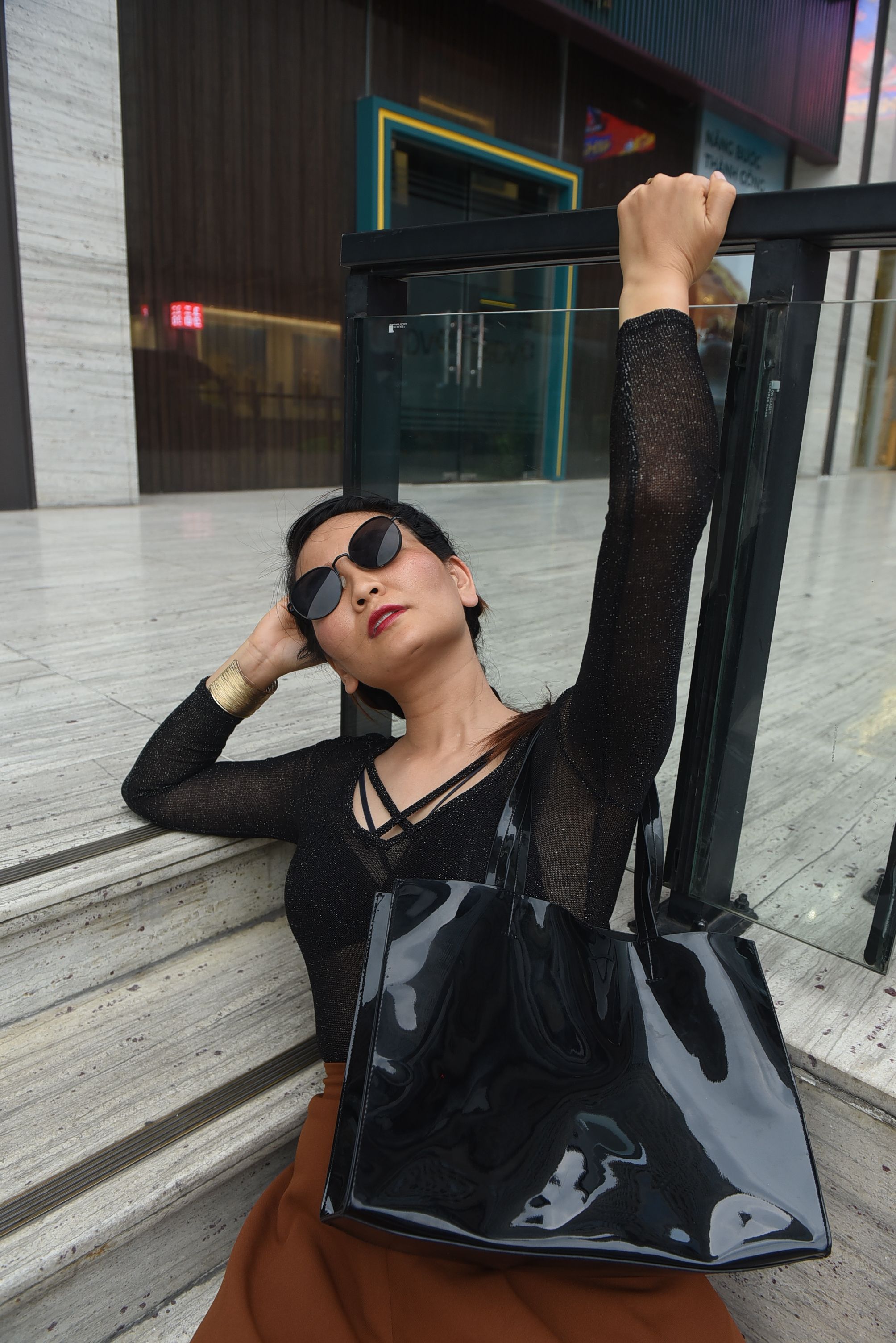 Model in Sunglasses Posing in Downtown · Free Stock Photo