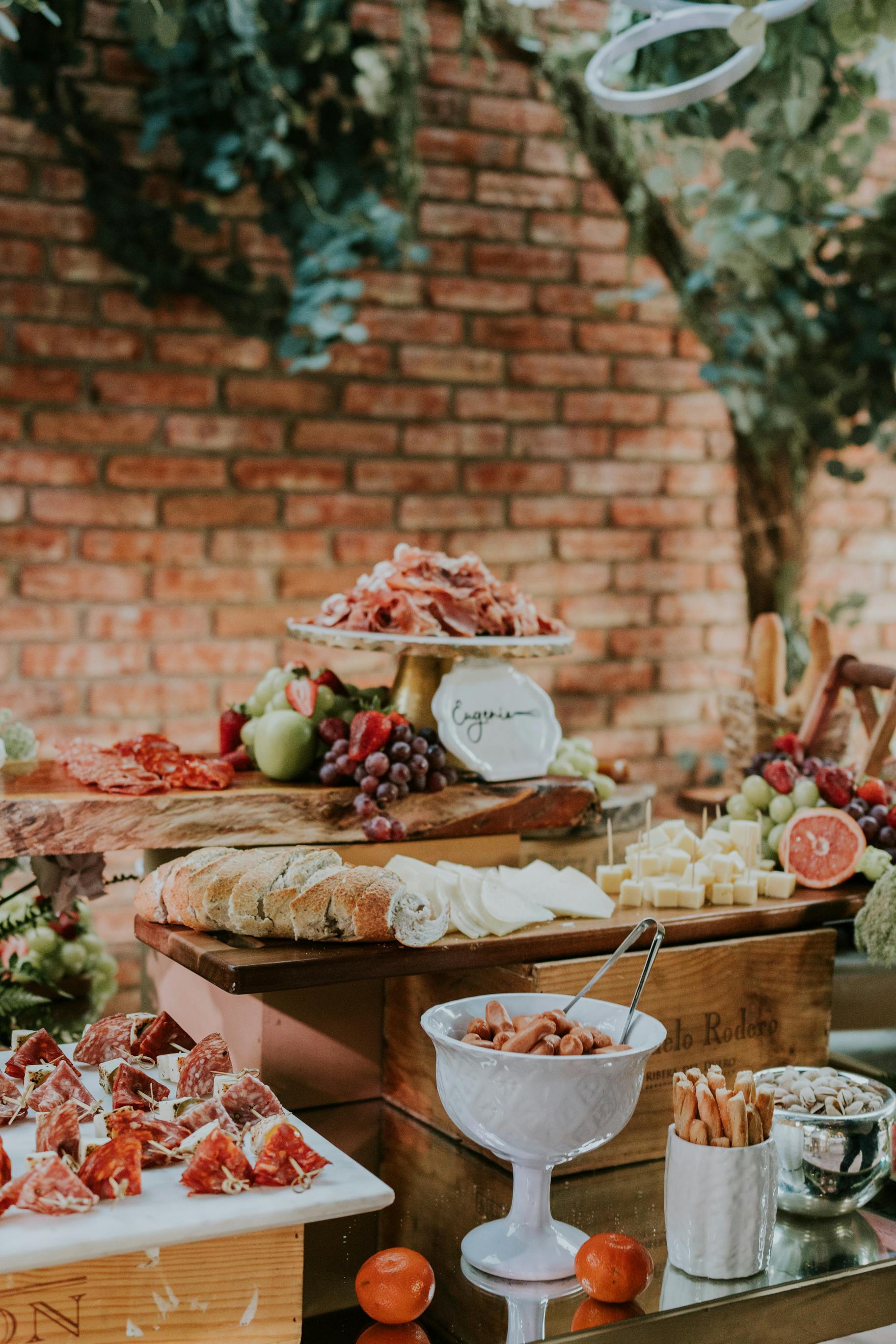 buffet with cheese fruits and bread