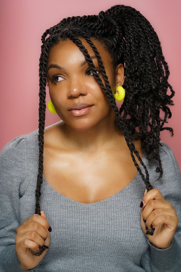 Two-strand twists with gold earrings