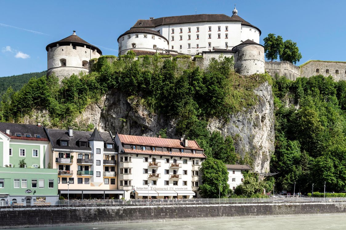 View Of The Waterfront Buildings And The Kufstein Fortress In Kufstein View Of The Waterfront Buildings And The Kufstein Fortress In Kufstein