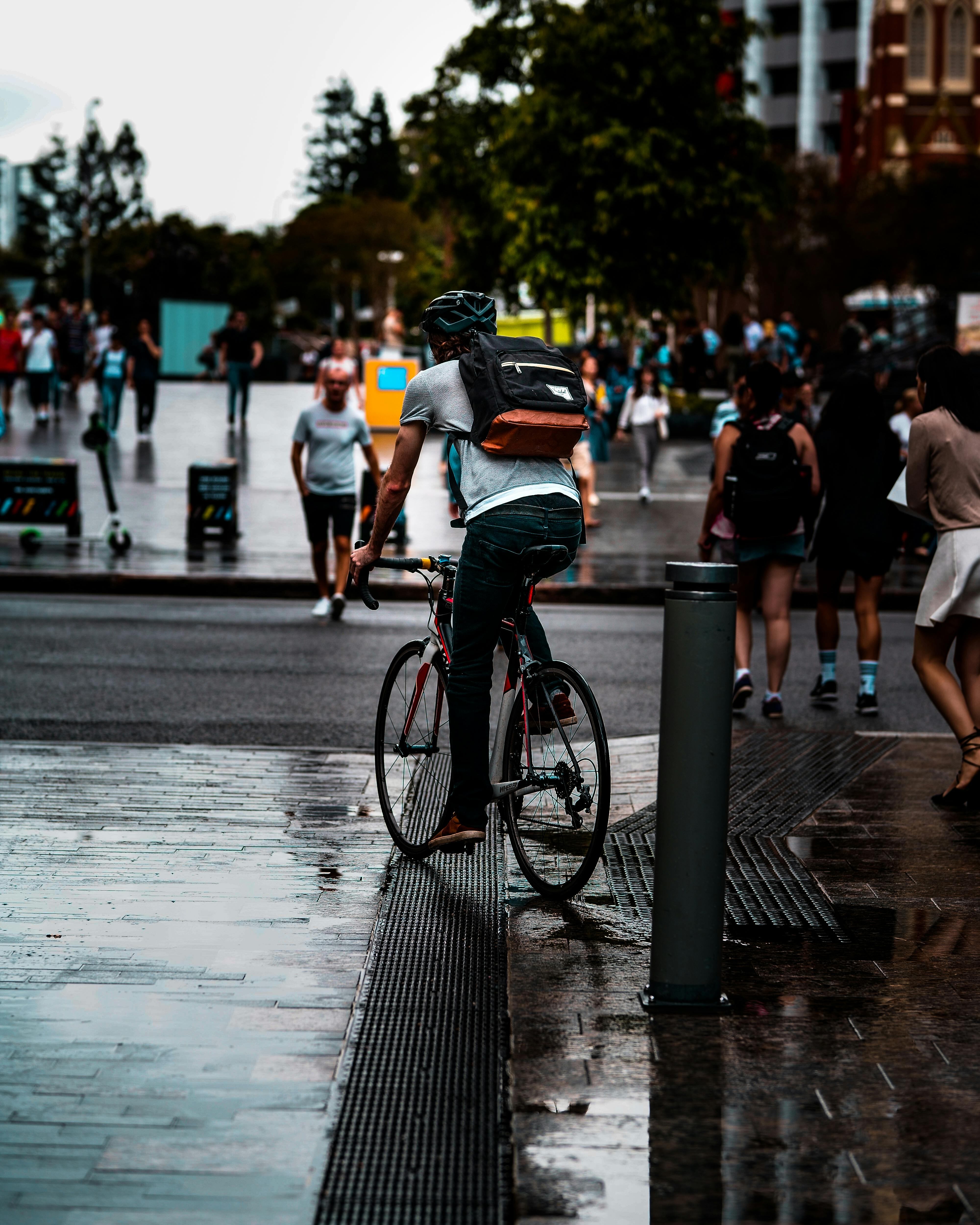 Person Riding Bike on Road · Free Stock Photo