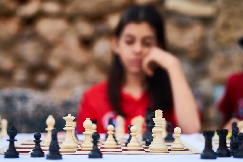 Vrouw die schaak speelt