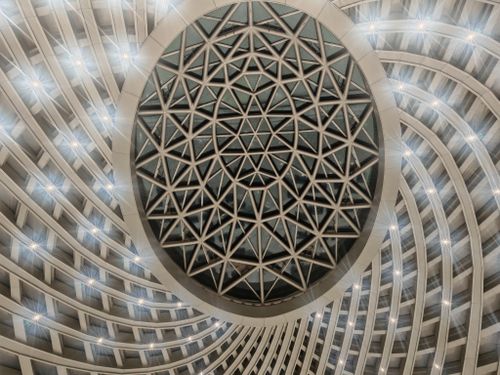 Free Intricate geometric ceiling design with modern architecture in Binhai District, Tianjin. Stock Photo