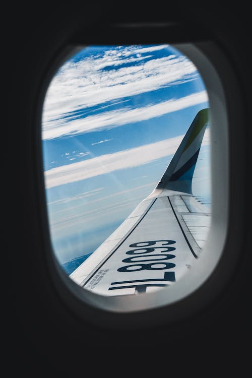 Gratis lagerfoto af blå himmel, fly vindue, flyrejse