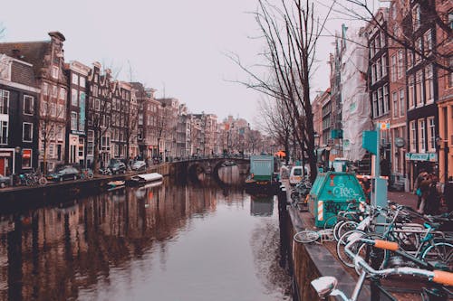 river between buildings