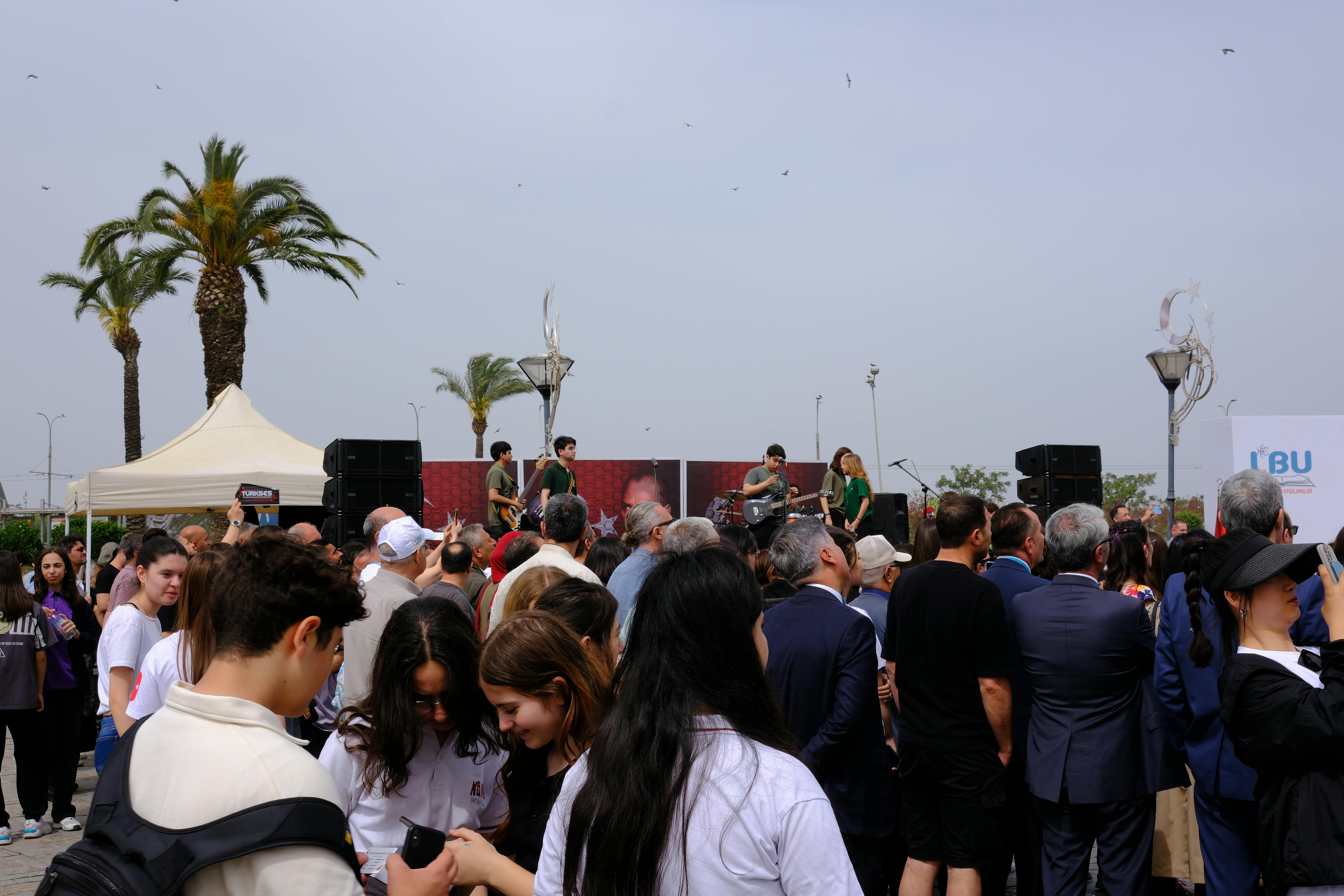 view of an audience and a band playing on stage