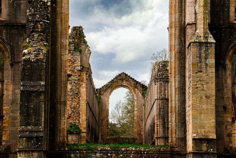 The ruins of an ancient abbey in rural England — the dissolution of the orders.