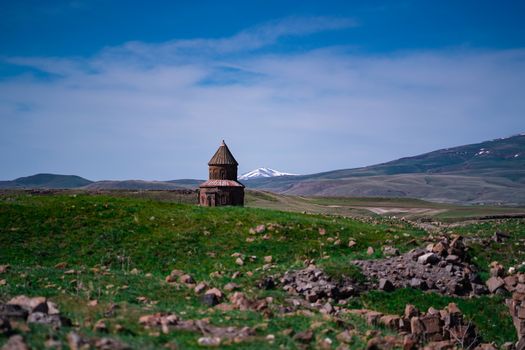 Explore the ancient Church of St. Gregory surrounded by breathtaking landscapes in Kars, Turkey, a UNESCO World Heritage site.