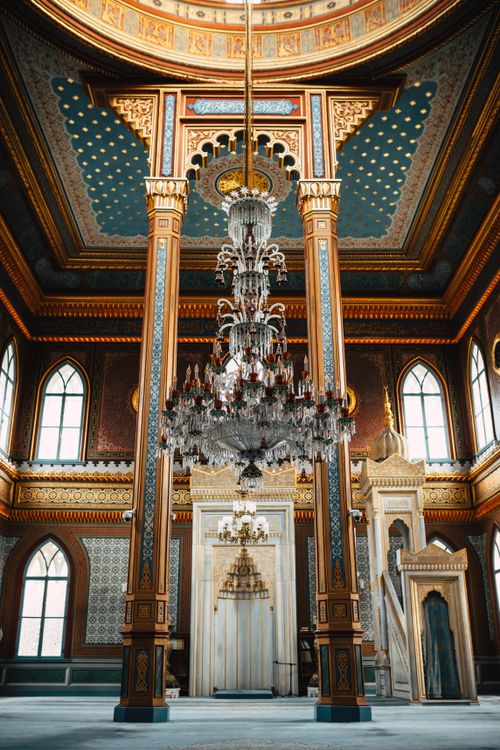 Free Intricate ornamentation and chandeliers in Istanbul's Yildiz Hamidiye Mosque. Stock Photo