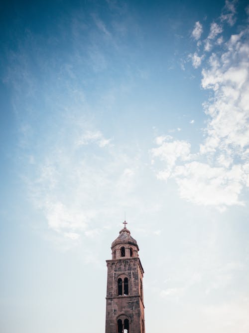 White and Blue Cloudy Sky over Church Belfry