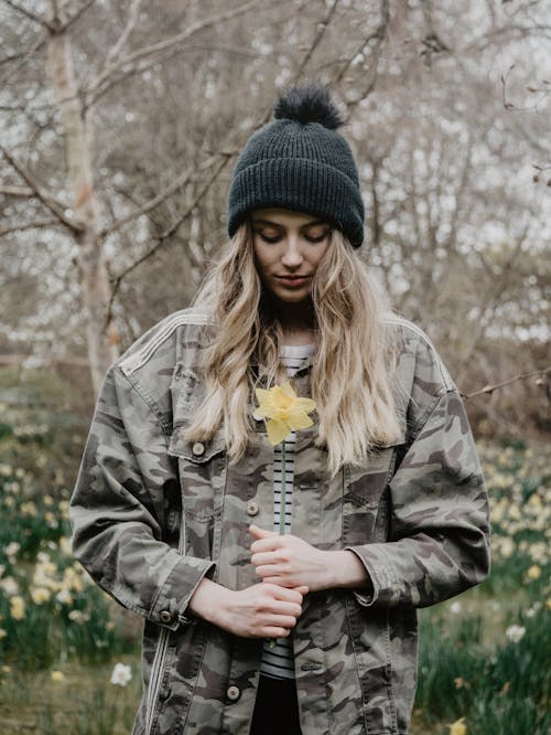 Free Woman Holding A Flower Stock Photo