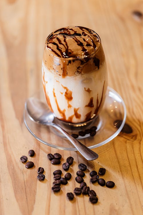 A glass of coffee with ice cream and chocolate