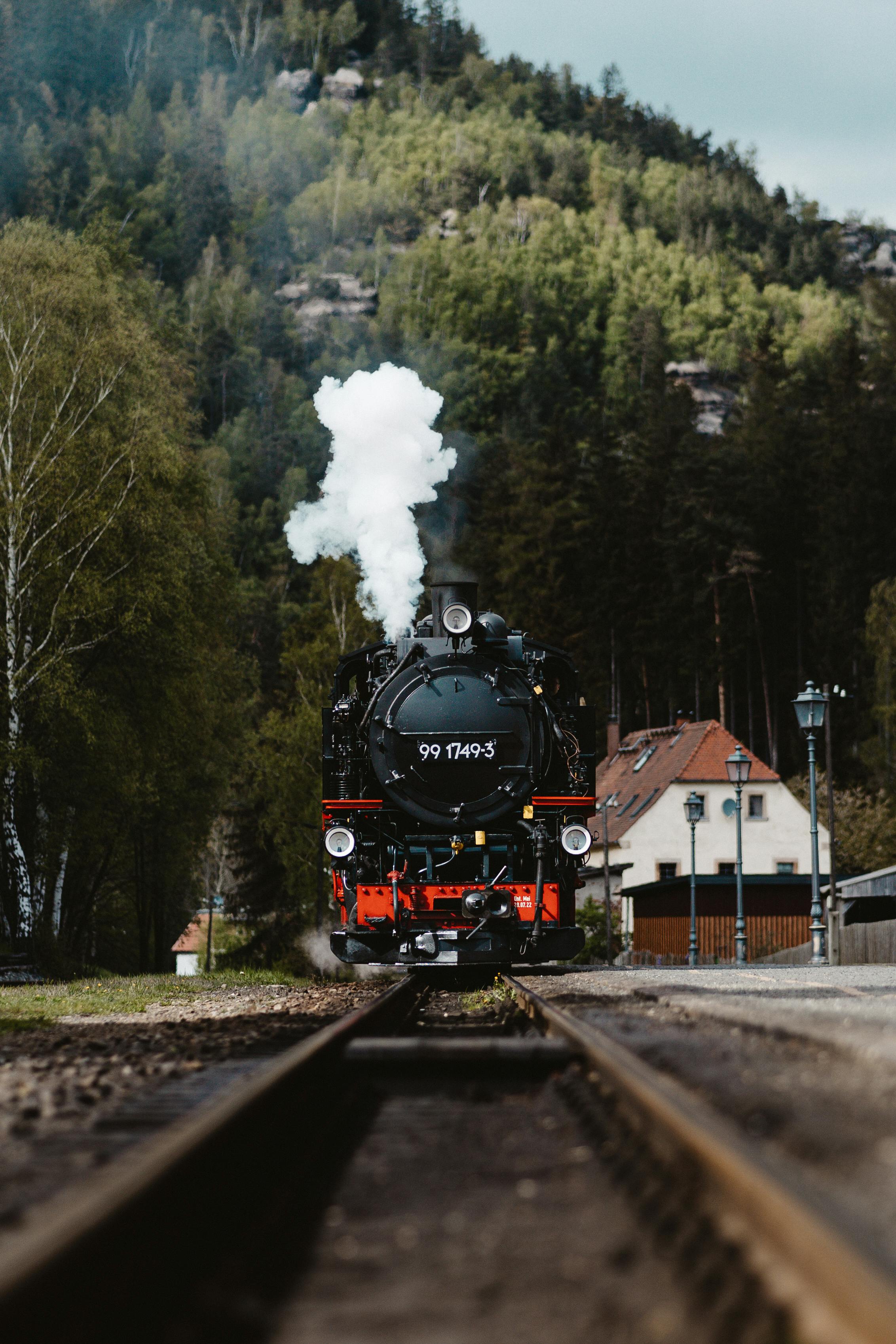 steaming vintage locomotive