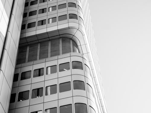 Grayscale Photo of Concrete Building