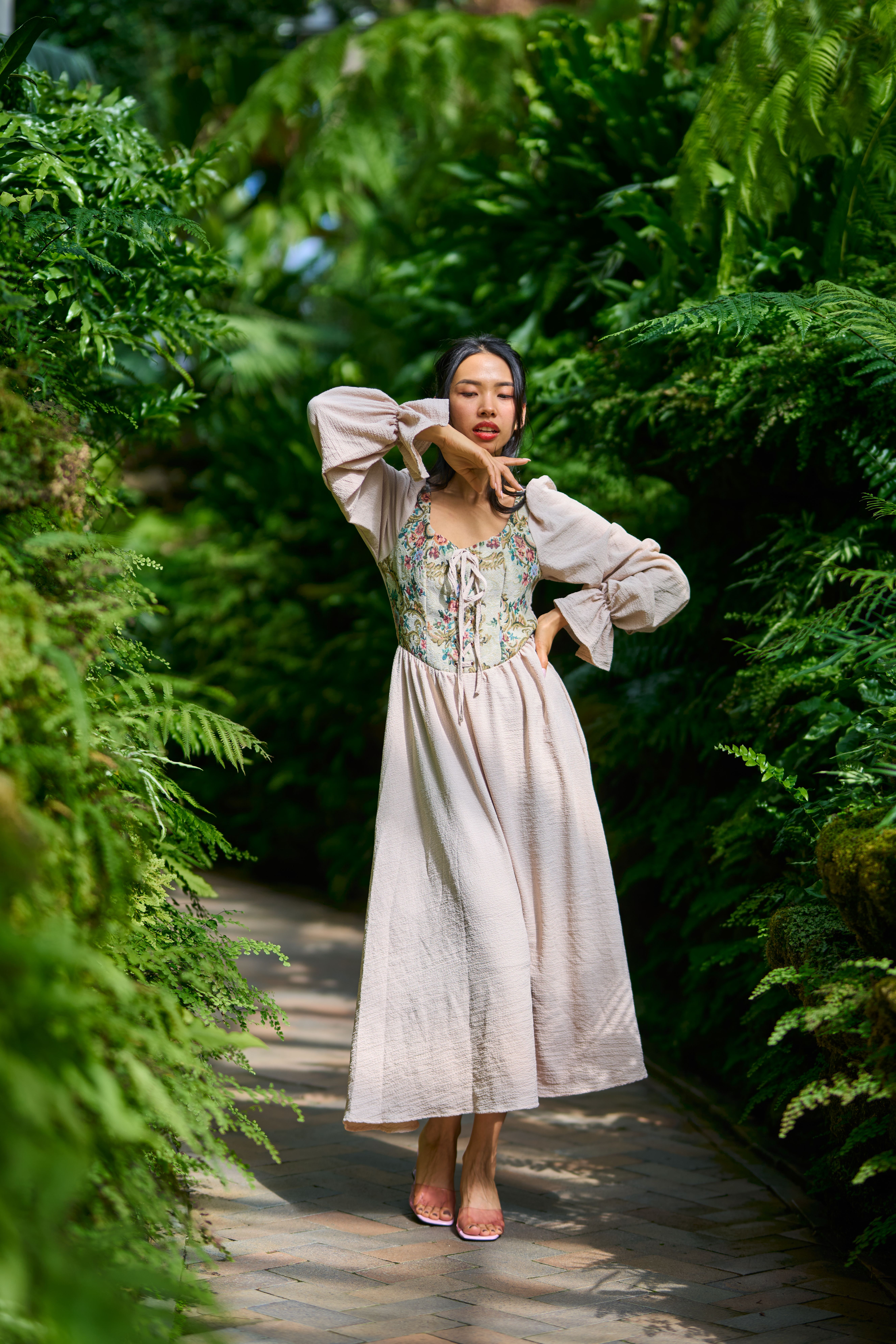 Portrait of a Woman Posing in a Dress · Free Stock Photo