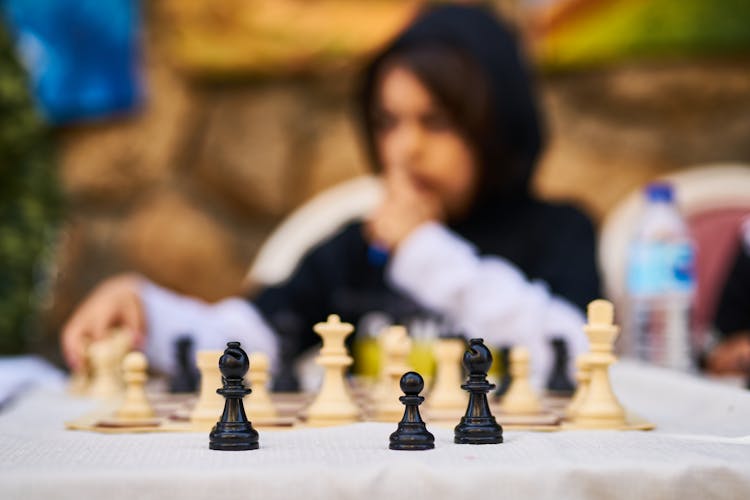 Selective Focus Photography Of Chess Board Set